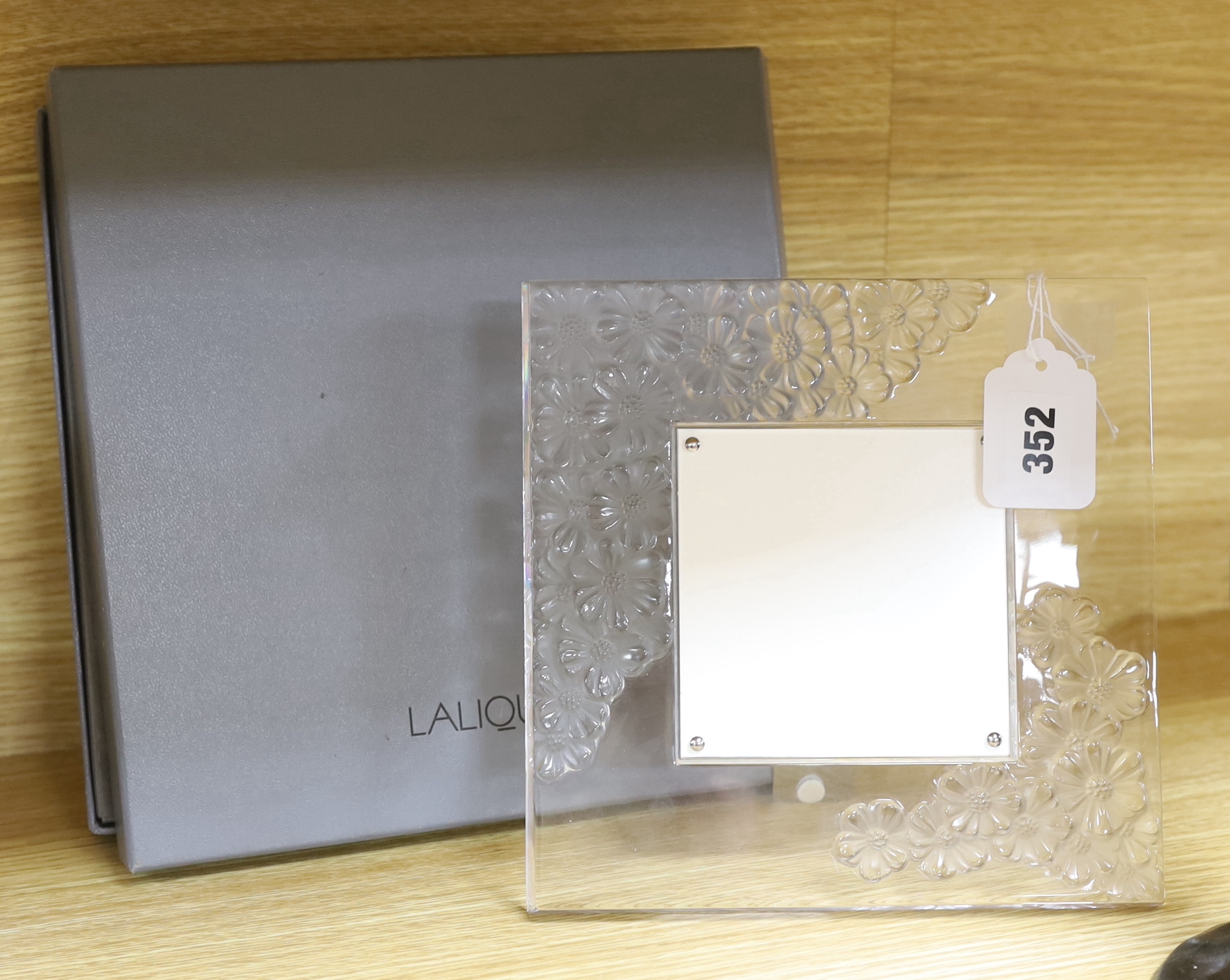 A Lalique easel floral photograph frame, signed, with box, 21cm high